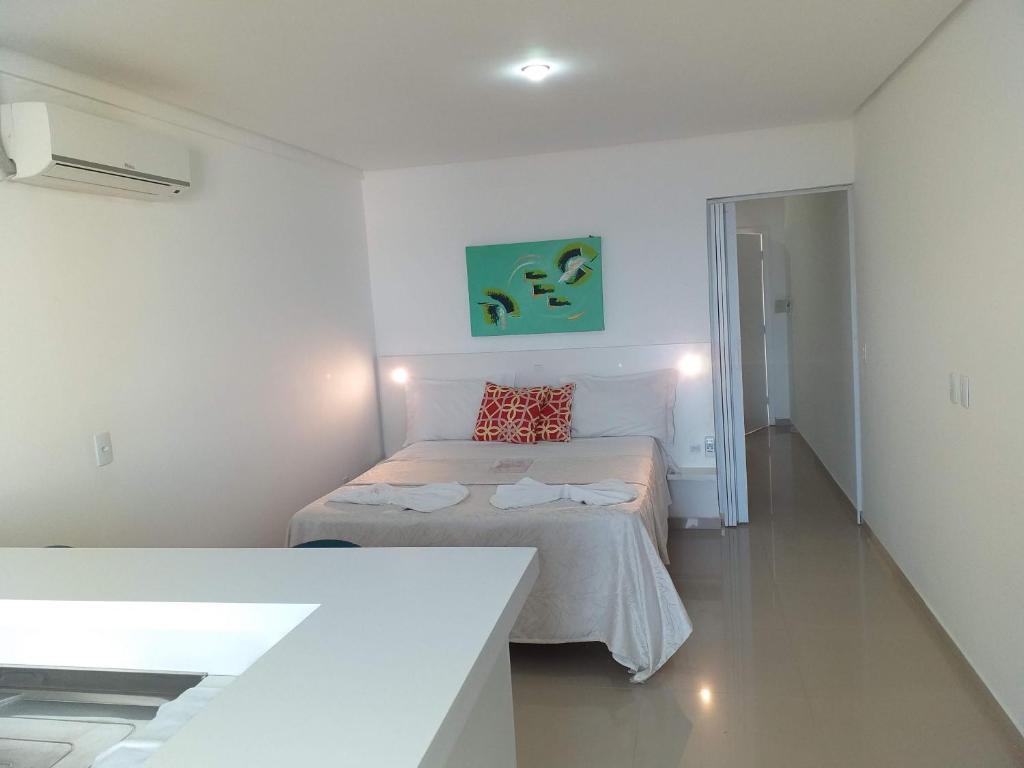 Cama ou camas em um quarto em Pousada Pedras do Mariscal