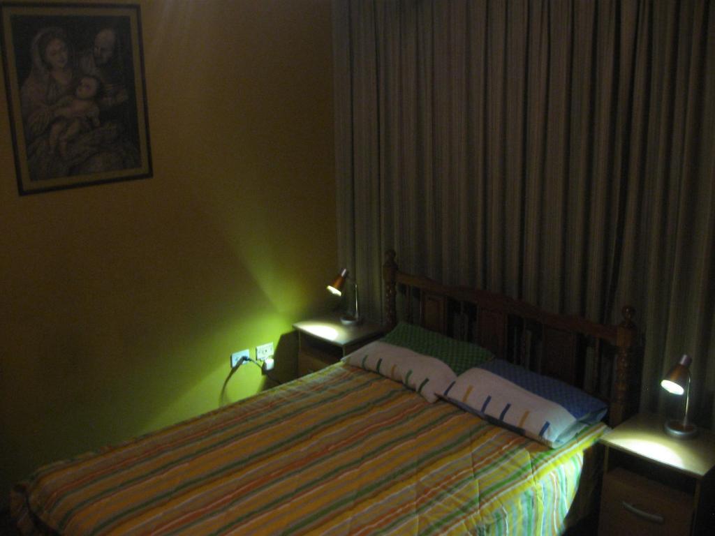 Letto o letti in una camera di Posada Peregrinus