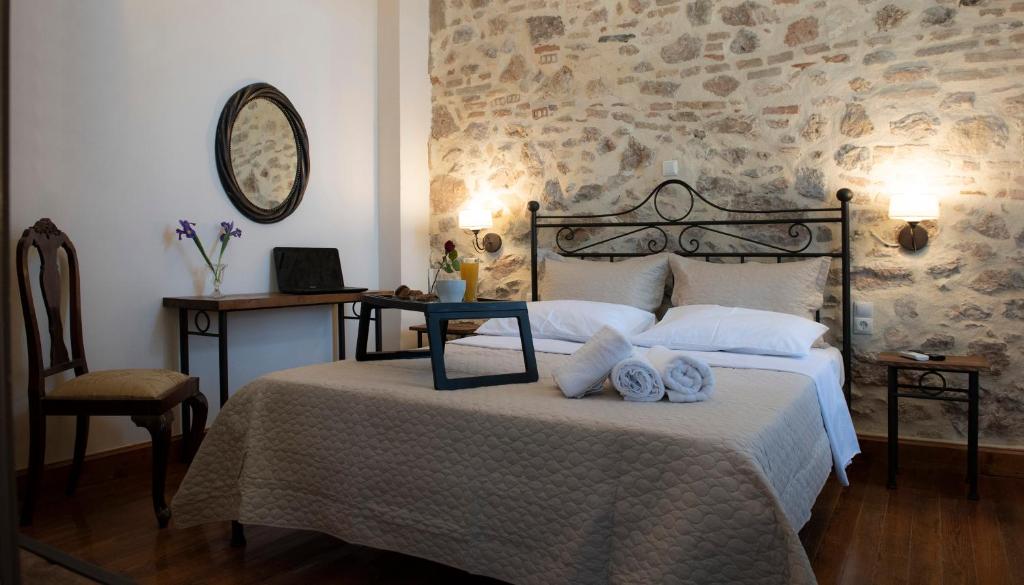 Postel nebo postele na pokoji v ubytování Beautiful City Suites