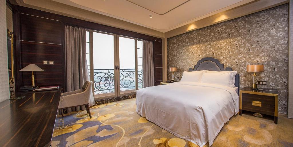Postel nebo postele na pokoji v ubytování Chateau Star River Guangzhou-Chateau Star River Guangzhou-Trade Fair Shuttle Bus