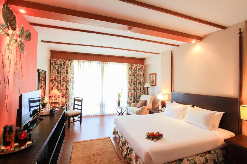 Postel nebo postele na pokoji v ubytování Belle Villa Resort, Chiang Mai