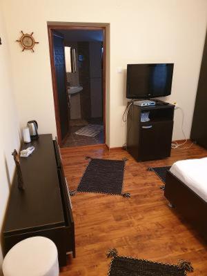 TV a/nebo společenská místnost v ubytování Casa Carter