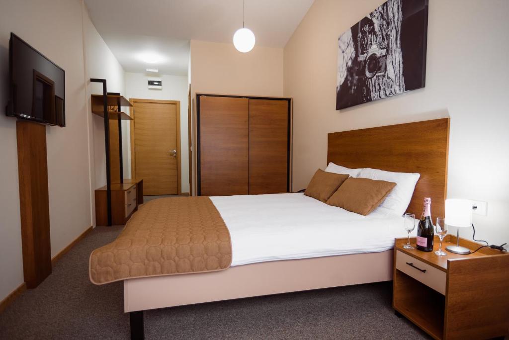 Giường trong phòng chung tại Sajam Garni hotel