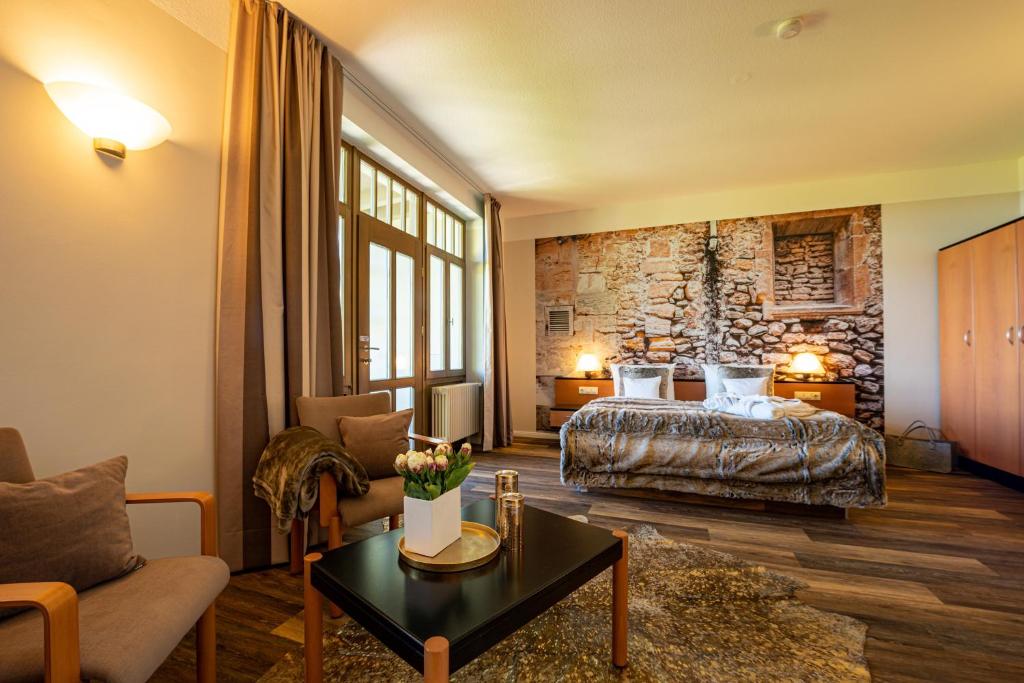 Postel nebo postele na pokoji v ubytování Hotel Villa Halliger