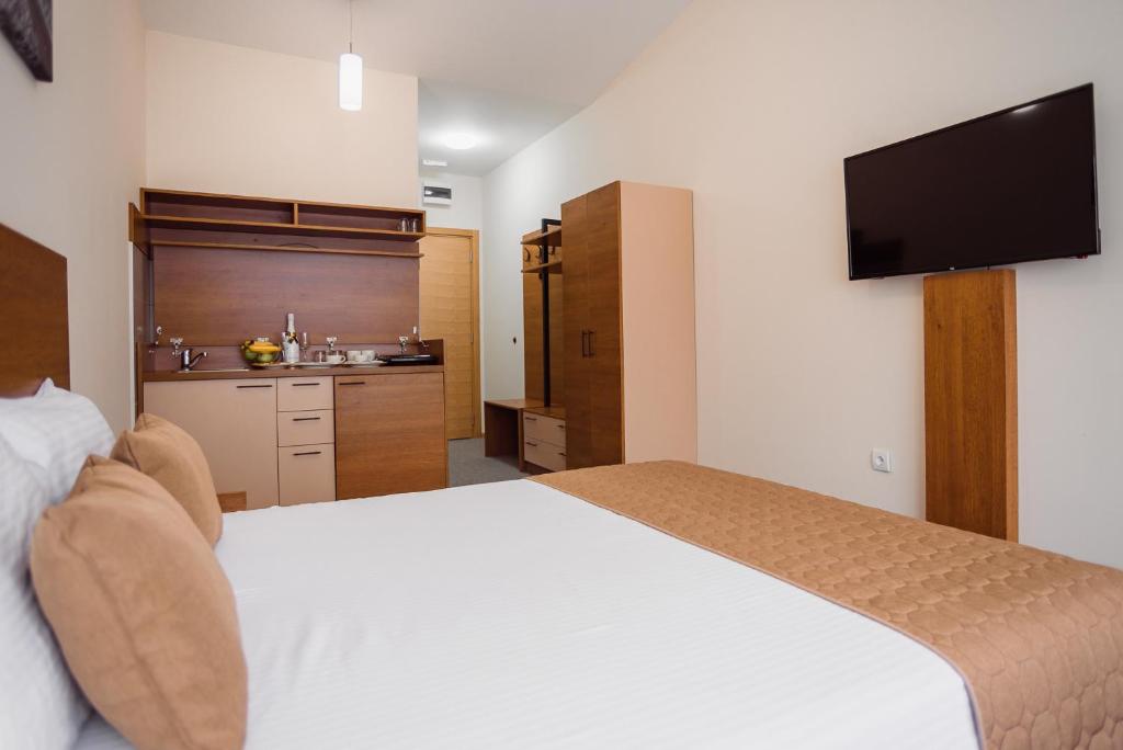 Giường trong phòng chung tại Sajam Garni hotel