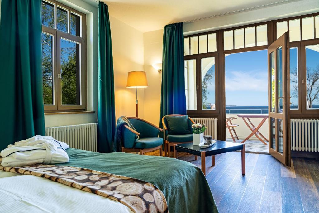 Postel nebo postele na pokoji v ubytování Hotel Villa Halliger