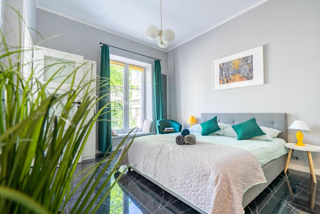 Posteľ alebo postele v izbe v ubytovaní Stylish studio in the heart of the city.