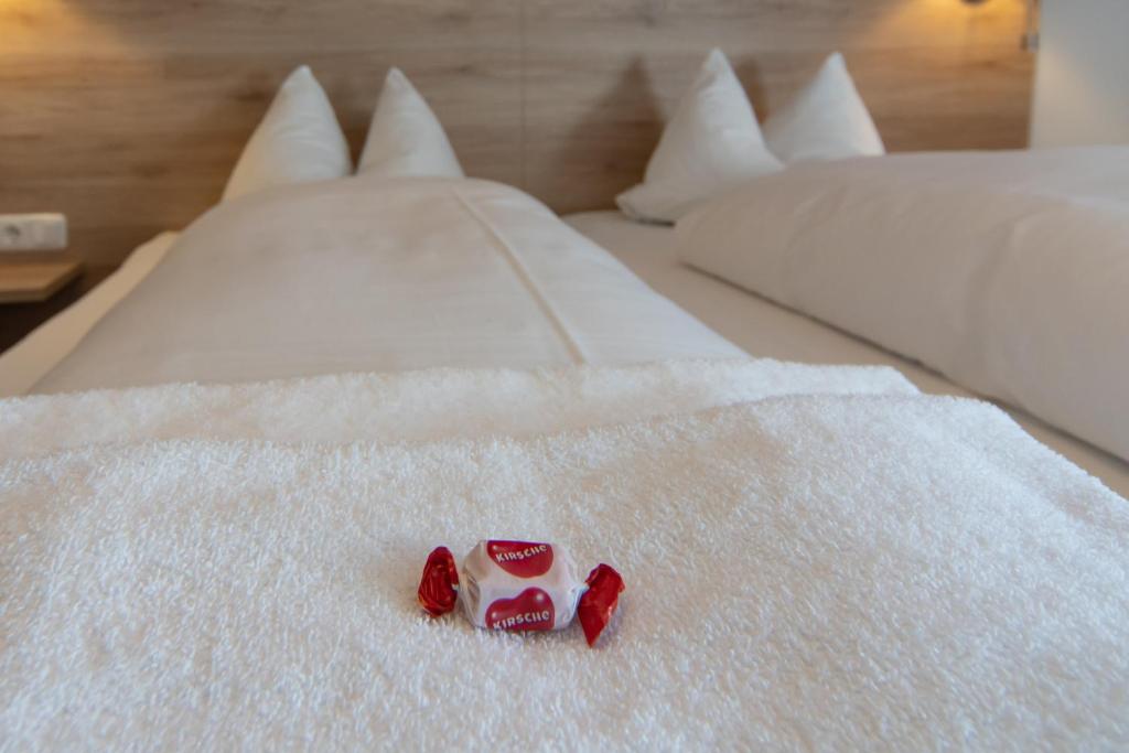 Postel nebo postele na pokoji v ubytování Hotel Weißbräu