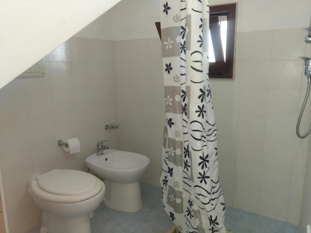 Koupelna v ubytování Orchidea