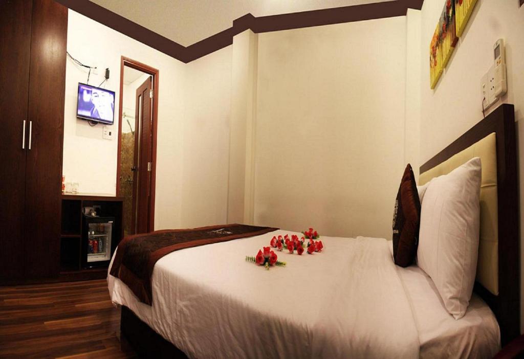 Postel nebo postele na pokoji v ubytování Brown Bean 2 Hotel