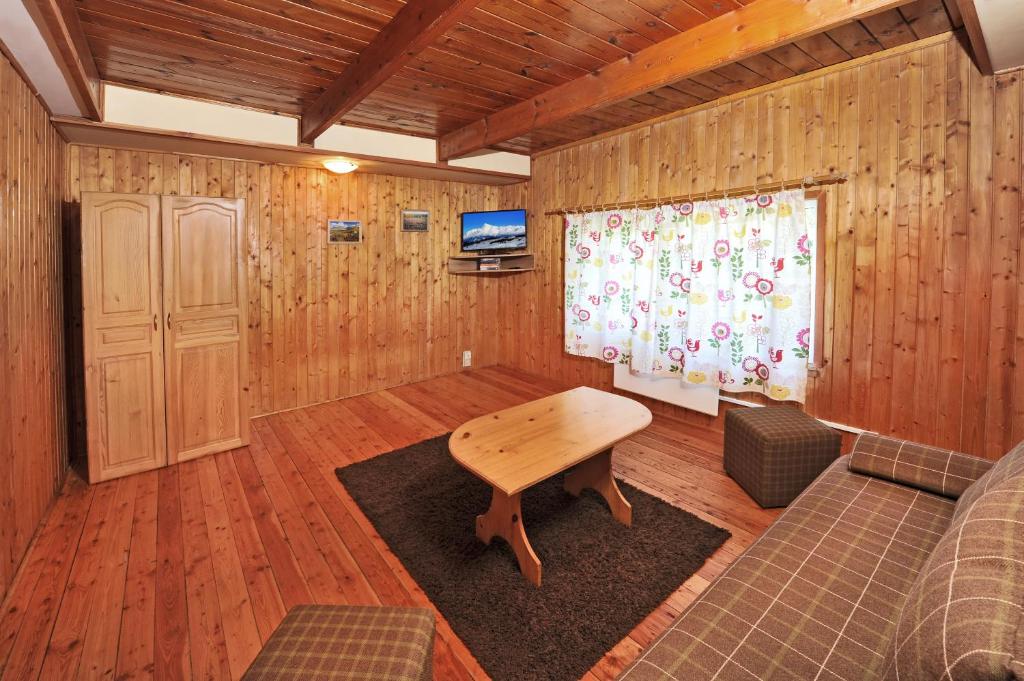 TV a/nebo společenská místnost v ubytování APLEND Chaty Tatry Holiday