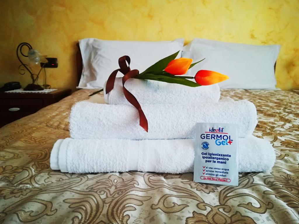 Postel nebo postele na pokoji v ubytování B&B Arcobaleno