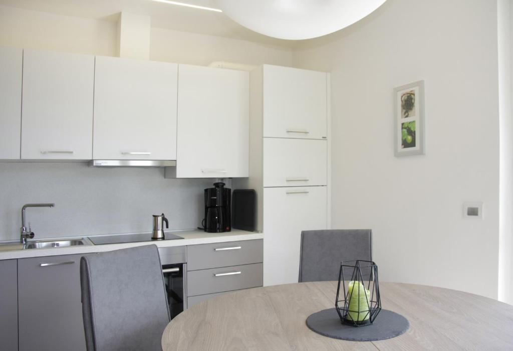 Kuchyň nebo kuchyňský kout v ubytování Appartamento Mandorla - Theater Home