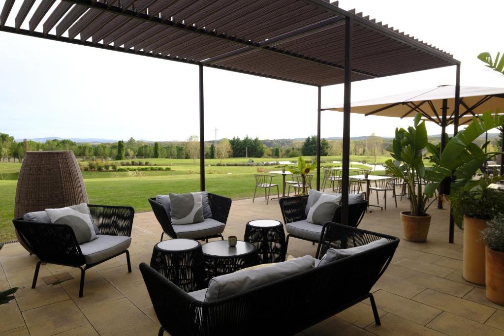 Posezení v ubytování Hotel Mas Solà