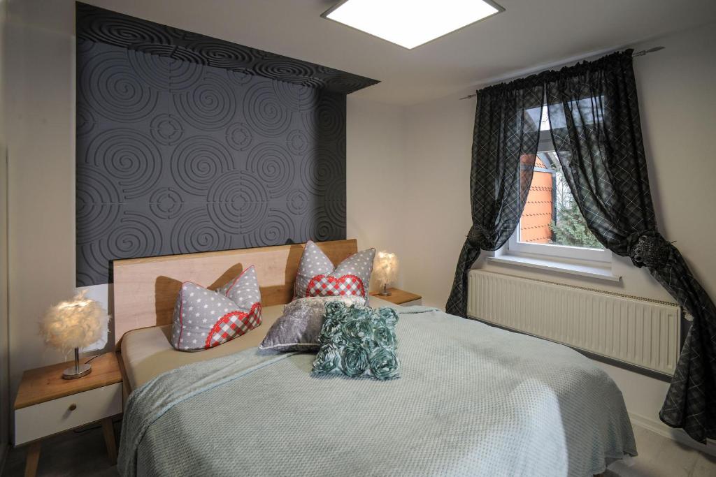 Postel nebo postele na pokoji v ubytování Boutique-Hotel UPGRADE