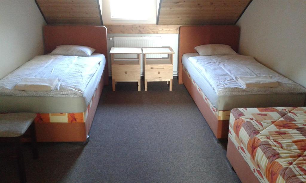 Postel nebo postele na pokoji v ubytování Hotel & Restaurant Adolfovský Dvůr