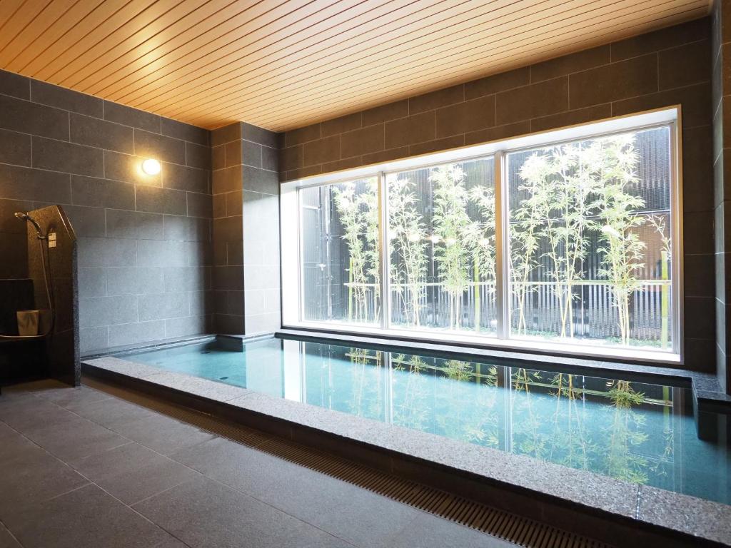 Bazén v ubytování Tabino Hotel Kashima nebo v jeho okolí