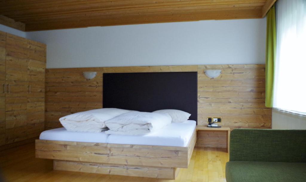 Postel nebo postele na pokoji v ubytování Hotel Edi