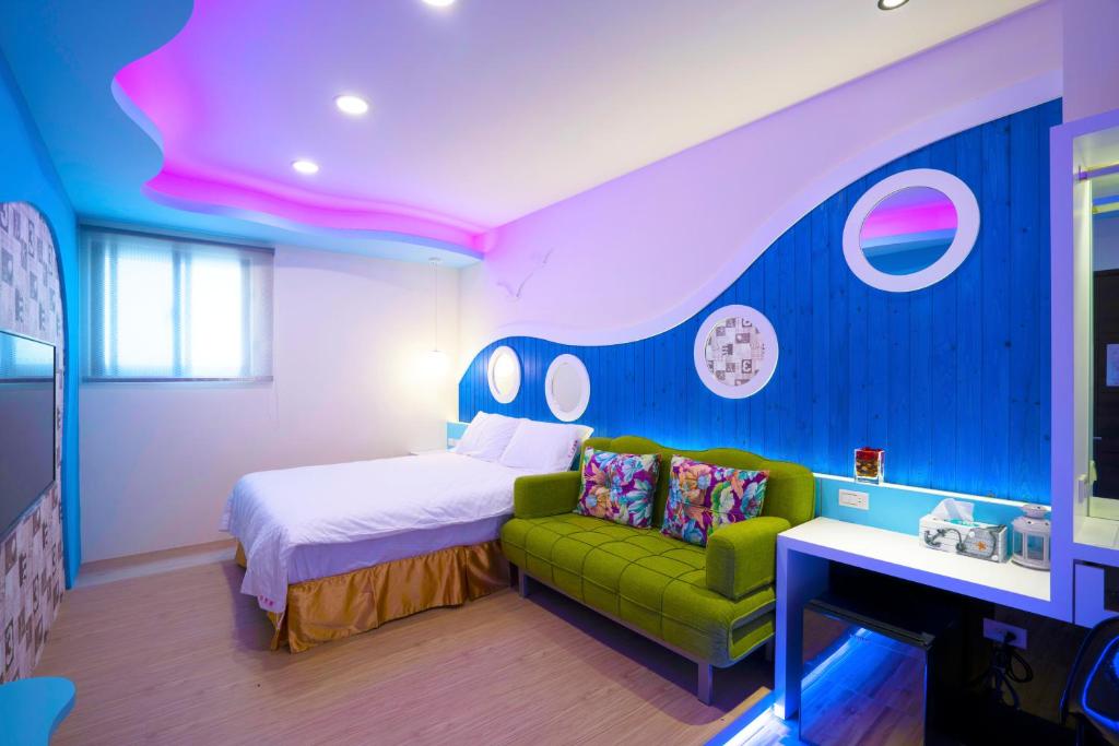 Postel nebo postele na pokoji v ubytování 愛丁堡集團市區精品及國王雙館民宿Edinburgh Boutique Hotel