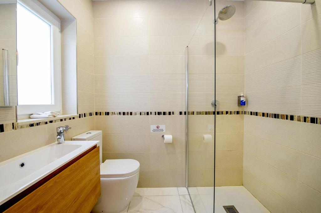 Vannituba majutusasutuses South Wind Guesthouse