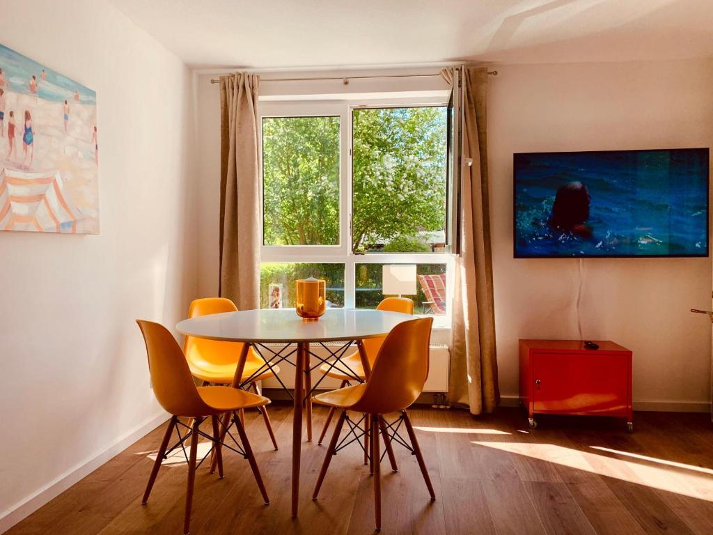 TV a/nebo společenská místnost v ubytování Strandperle