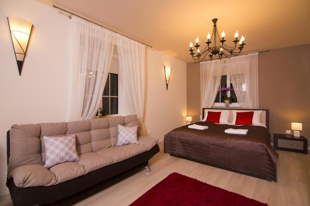 Posteľ alebo postele v izbe v ubytovaní Apartament Studio na Starówce w Kazimierzu Dolnym