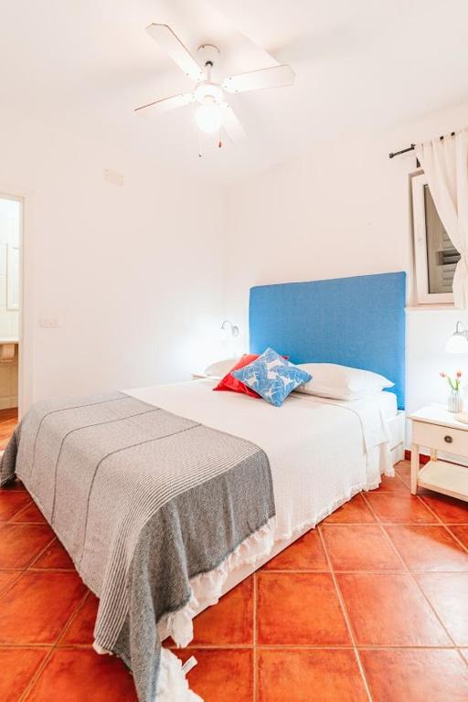 Postel nebo postele na pokoji v ubytování Sutivan Best Apartments