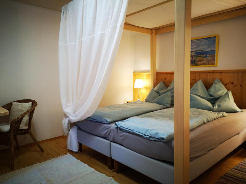 Postel nebo postele na pokoji v ubytování Stieglerhof KG
