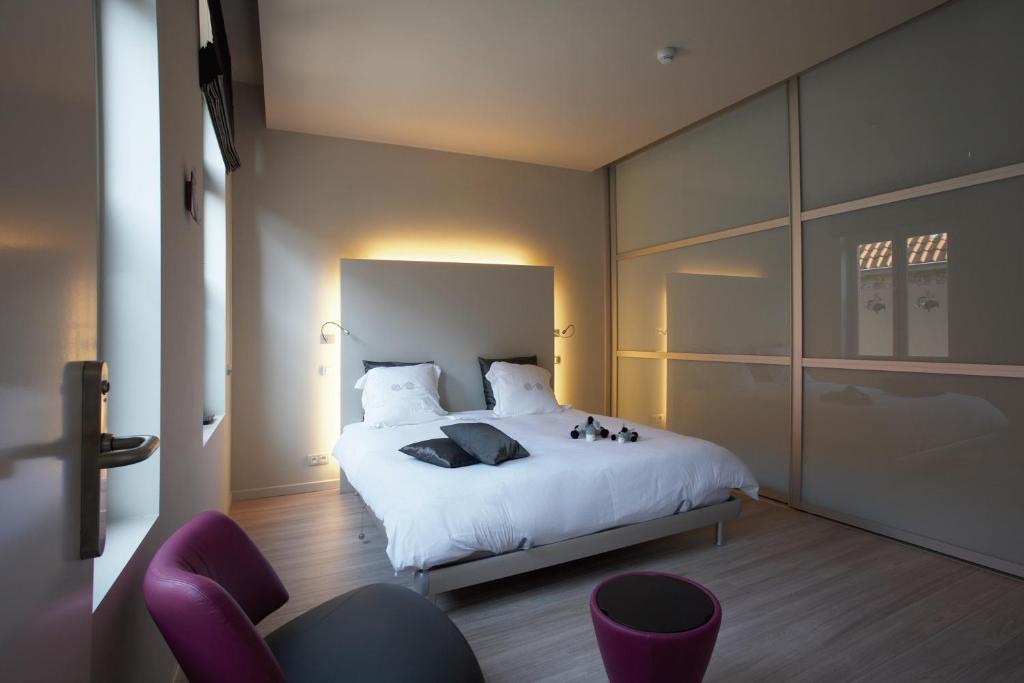 Postel nebo postele na pokoji v ubytování B&B Asinello