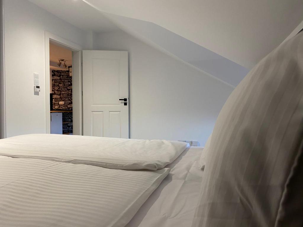 Posteľ alebo postele v izbe v ubytovaní Apartamenty Centrum
