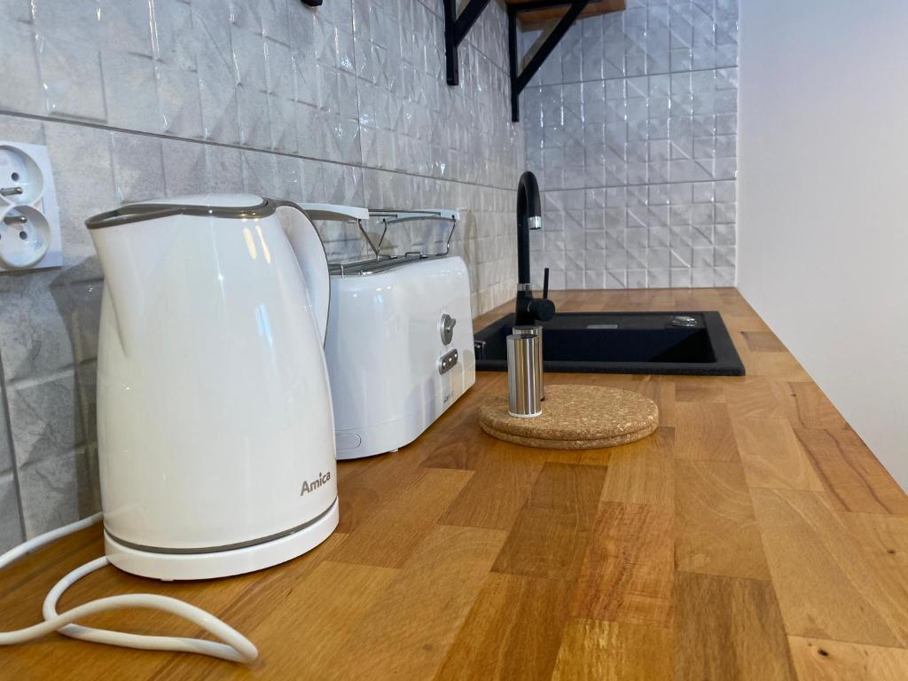 Kuchyňa alebo kuchynka v ubytovaní Apartamenty Centrum