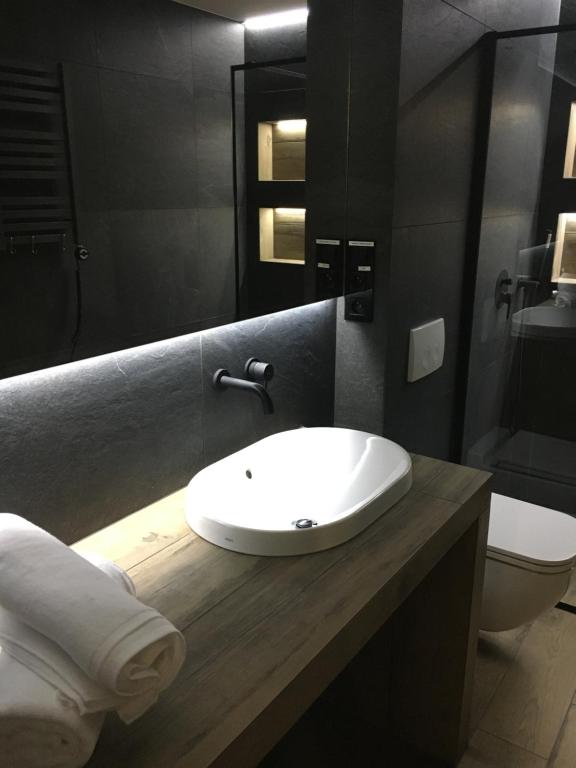 Kúpeľňa v ubytovaní Apartamenty Centrum
