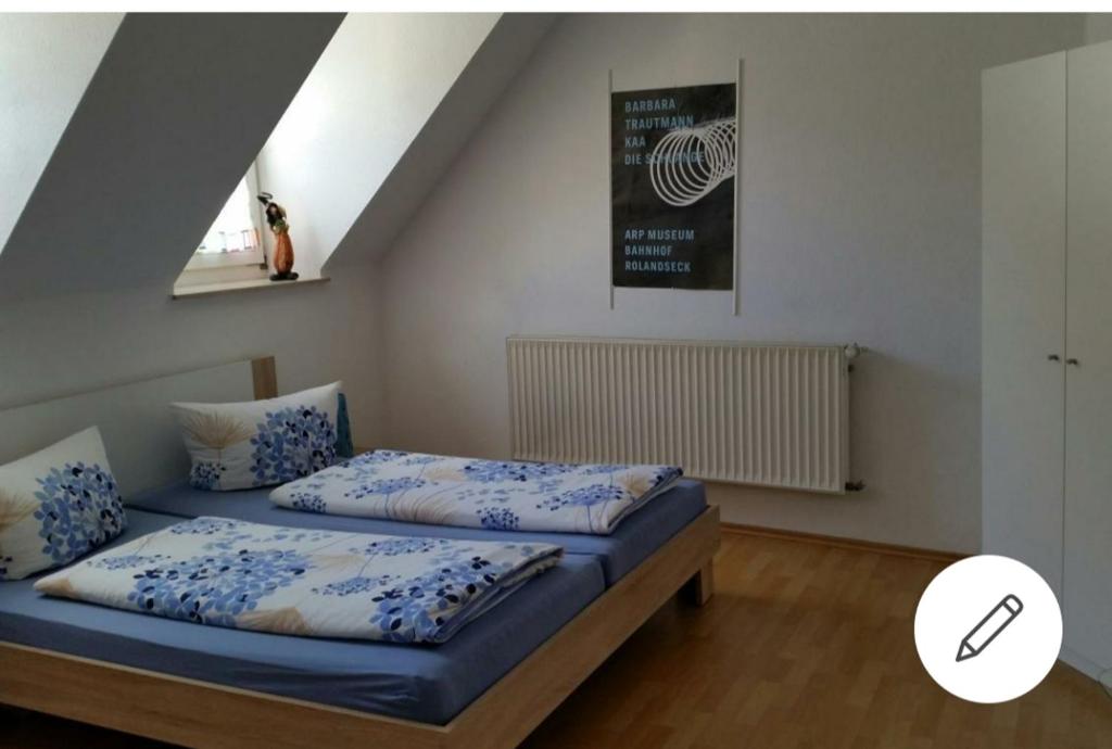 a bedroom with two beds in a attic at Gemütlich in Bacharach in Bacharach