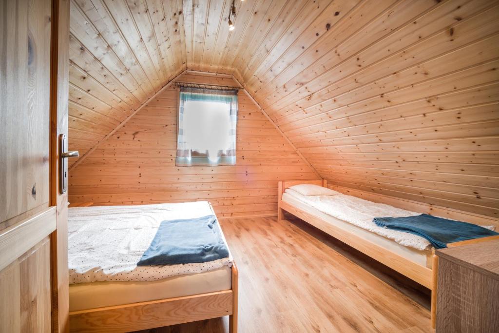 Postel nebo postele na pokoji v ubytování Morska Bryza