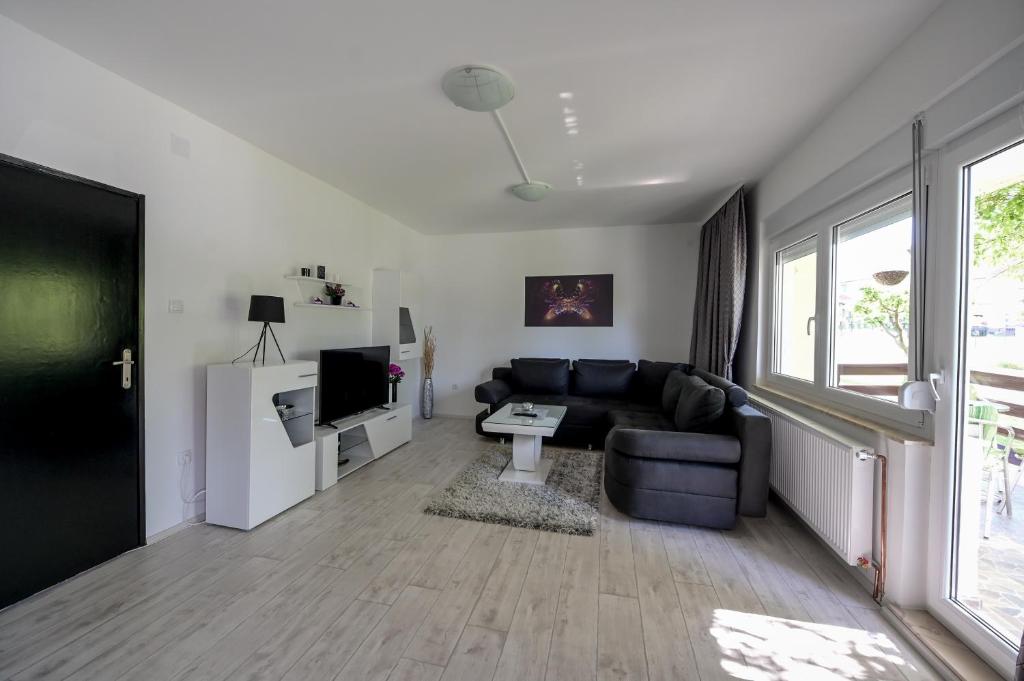 Kuchyň nebo kuchyňský kout v ubytování Apartman DORA