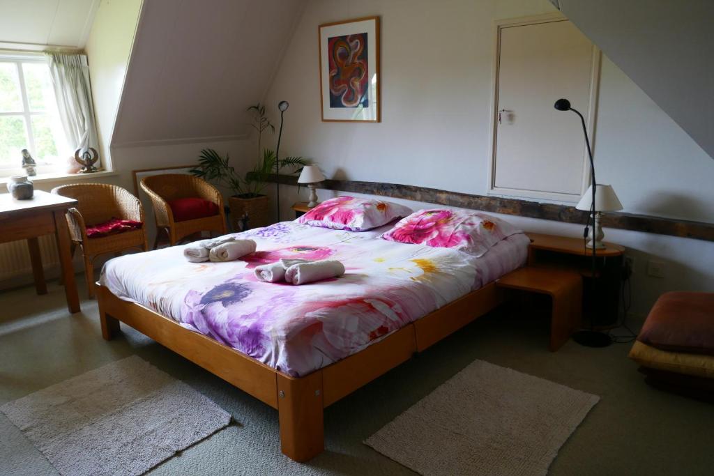 Postel nebo postele na pokoji v ubytování Rezonans