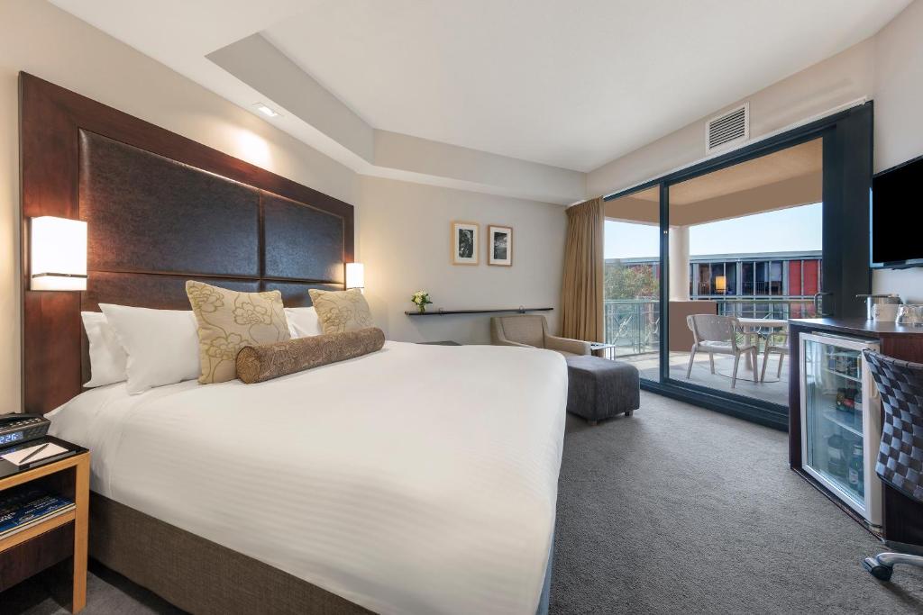 Postel nebo postele na pokoji v ubytování Amora Hotel Riverwalk Melbourne