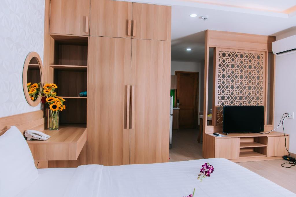 TV a/nebo společenská místnost v ubytování An Dương Hotel & Apartment
