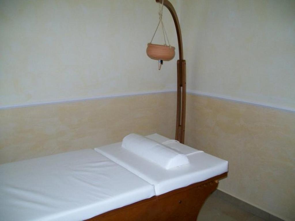 Postel nebo postele na pokoji v ubytování Hotel Federico II