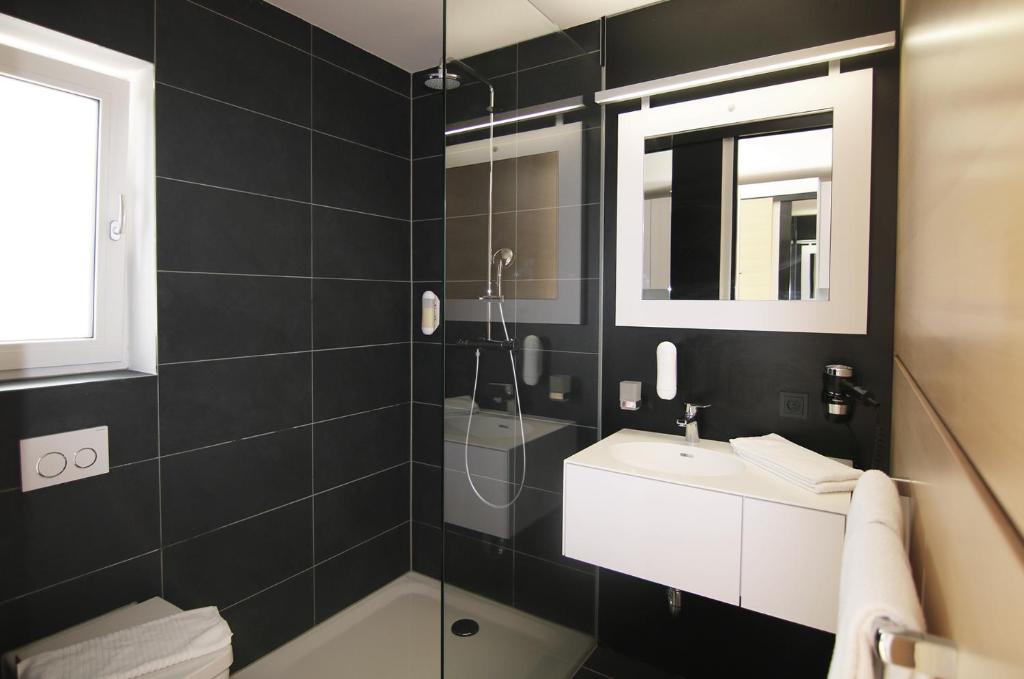Koupelna v ubytování ILL Hotel by WMM Hotels