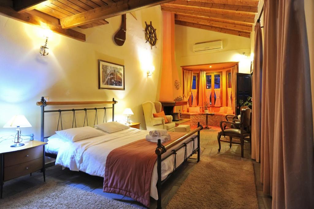 Ένα ή περισσότερα κρεβάτια σε δωμάτιο στο Ganimede Hotel, Galaxidi