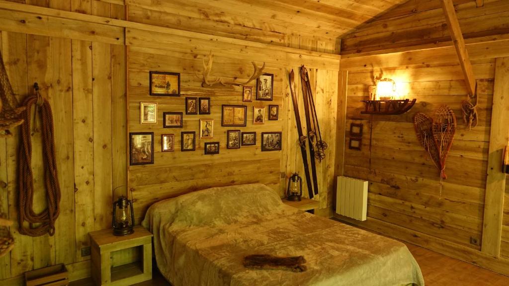 Postel nebo postele na pokoji v ubytování Chambres d'hôtes et table d'hôtes L'Intemporelle