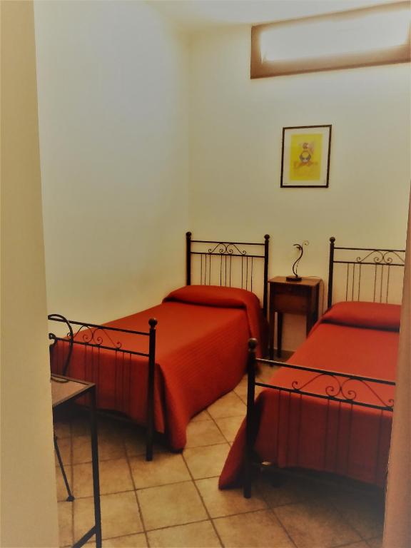 Postel nebo postele na pokoji v ubytování Hotel Pace