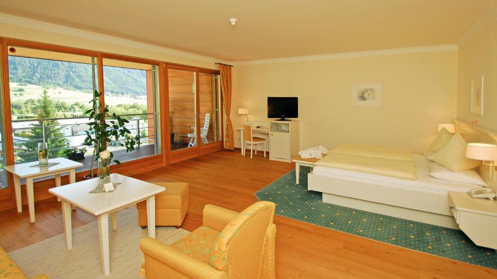 TV a/nebo společenská místnost v ubytování Hotel Olympia