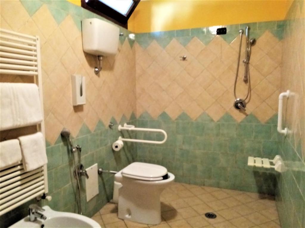 Koupelna v ubytování Hotel Pace