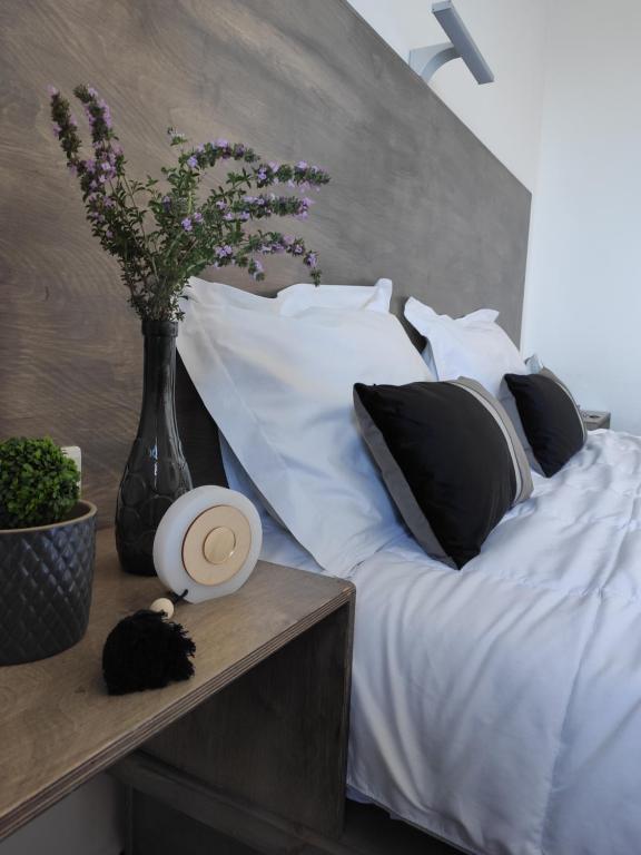 Postel nebo postele na pokoji v ubytování Afroditi Hotel
