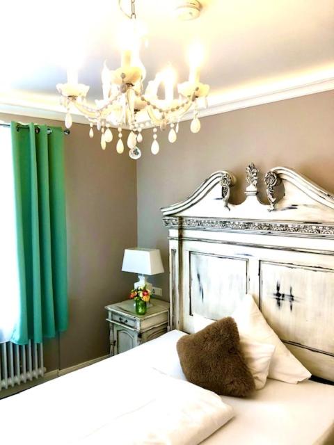 Postel nebo postele na pokoji v ubytování Boutiquehotel Villa Rosenhof