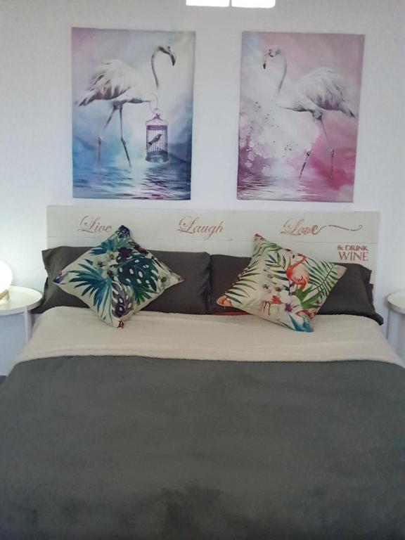 Posteľ alebo postele v izbe v ubytovaní Flamingo Suite with terrace and private bath by Flamingo House
