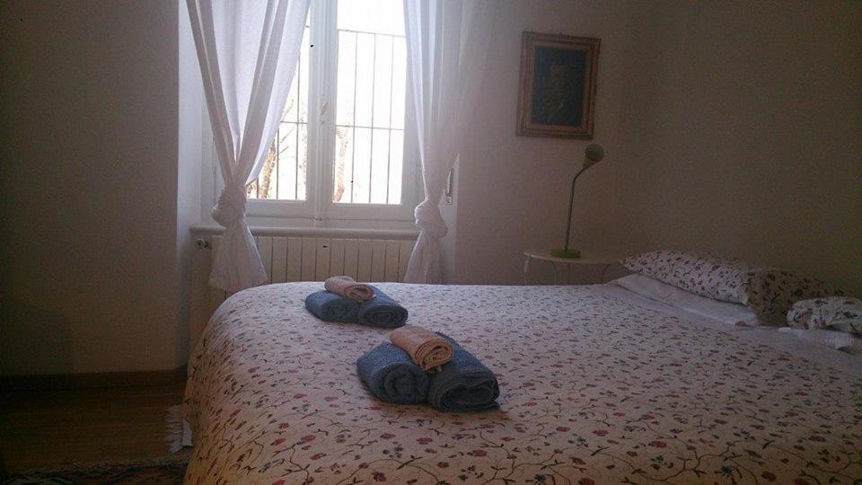 Postel nebo postele na pokoji v ubytování B&B I Ghiri