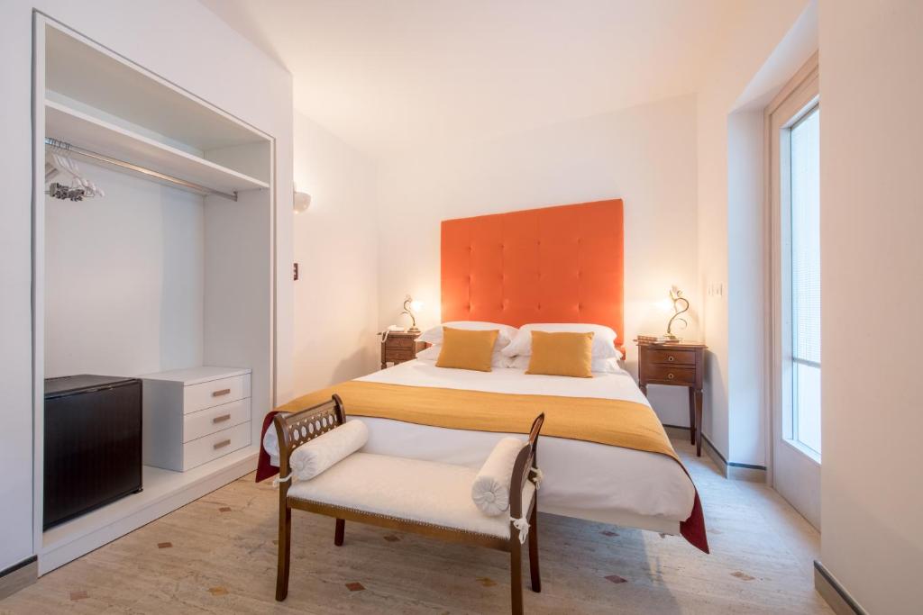 Posteľ alebo postele v izbe v ubytovaní DA Rooms